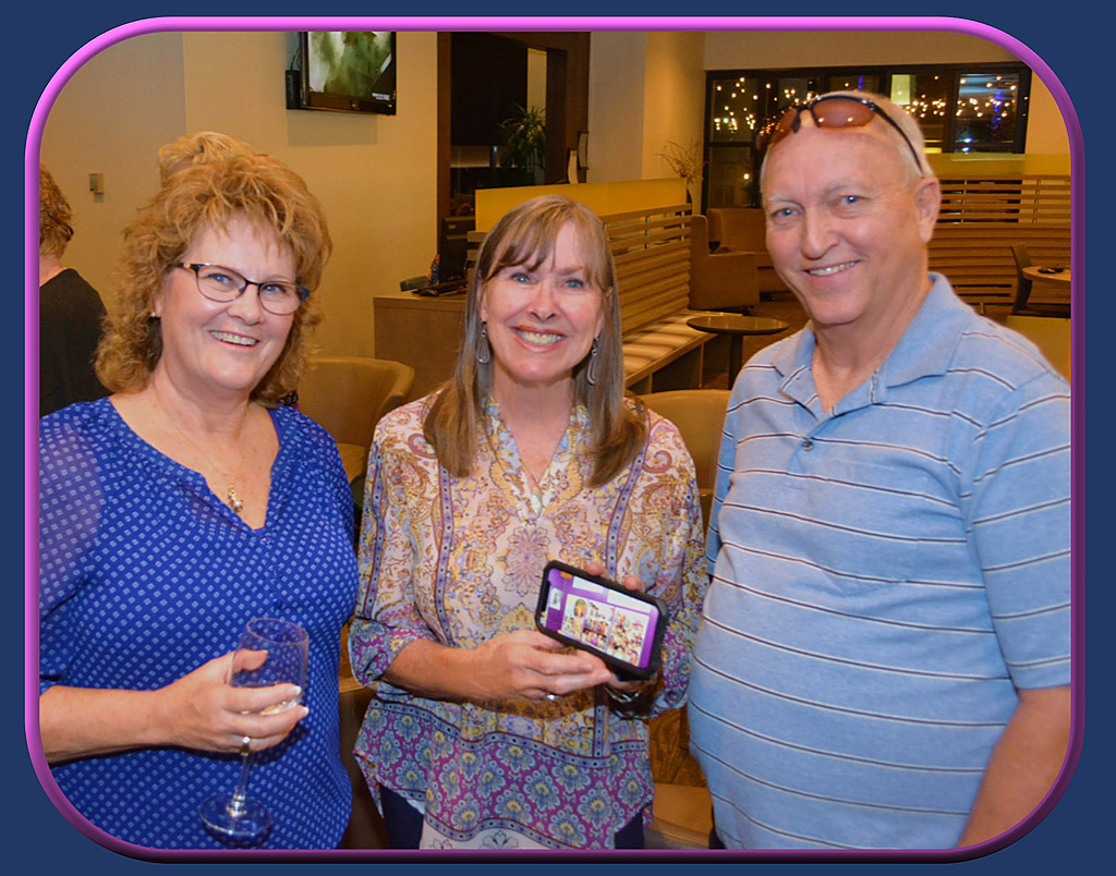 Lady in blue dress, Kathy Whittaker, and Ron