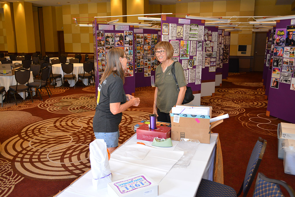 Kathy Whittaker and Mark's wife doing setup