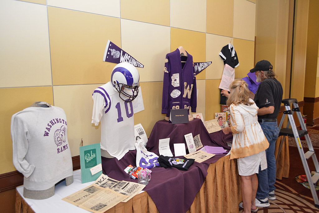 Melvin Schlink and Annelle Cook working on the memorabilia table