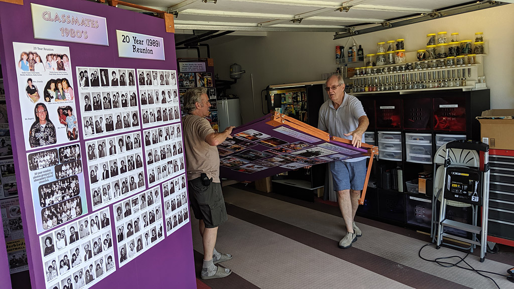 Dick and Brian carrying more walls out of garage